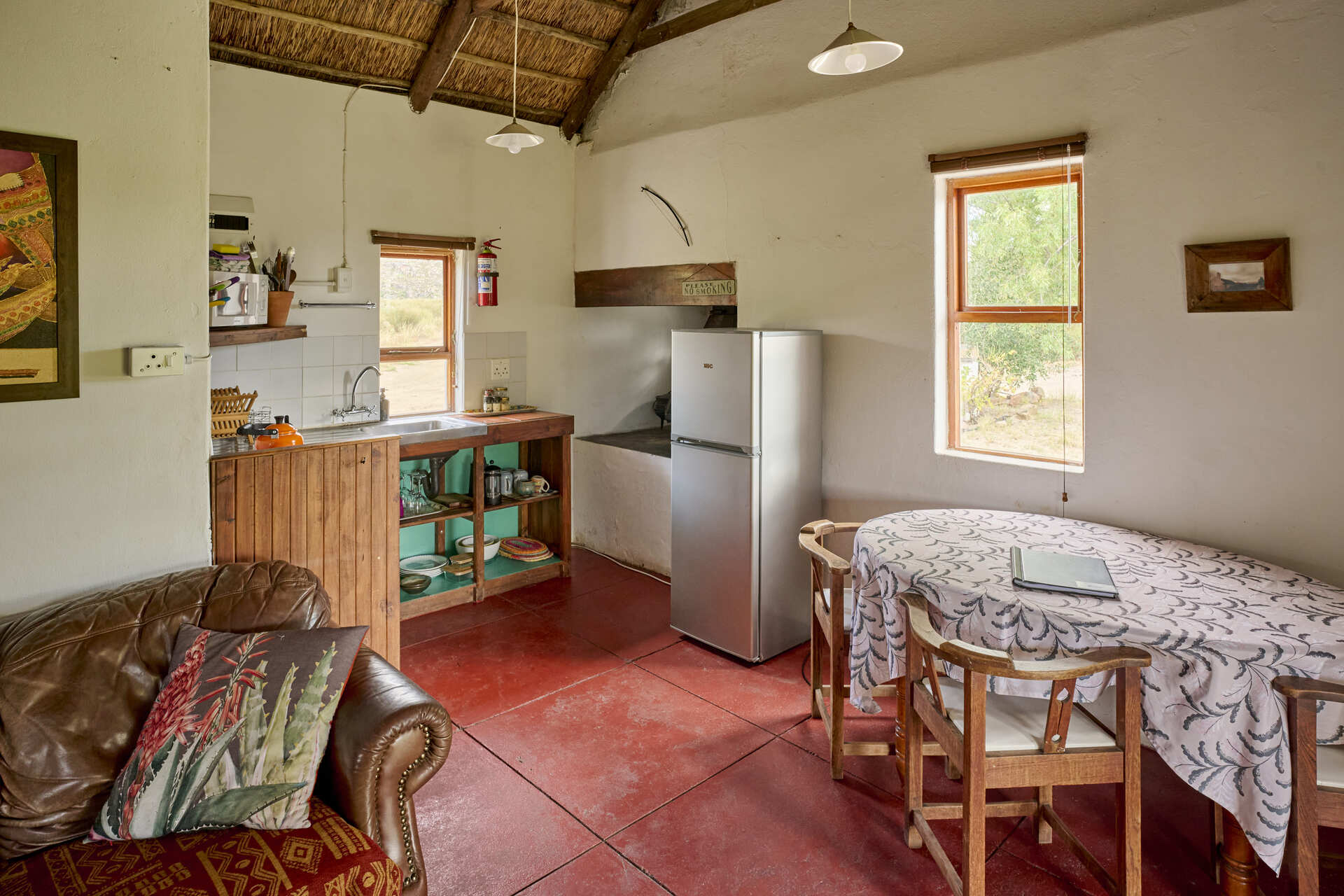 Self-catering kitchen and dining area in Weavers Cottage